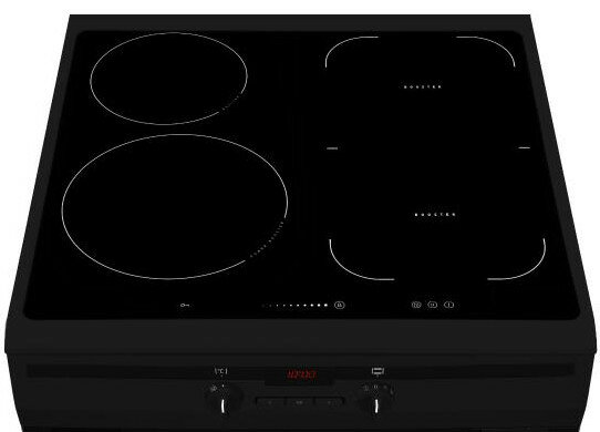 Czarny piekarnik z otwartymi drzwiami, prezentujący wnętrze.