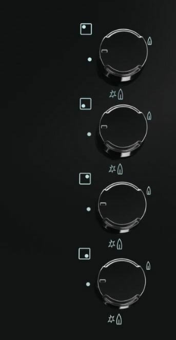 Pionowy widok czarnych pokręteł kuchenki z białymi ikonami na czarnej powierzchni.