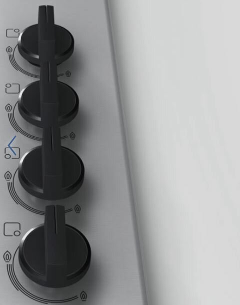 Zbliżenie elementów sterujących płyty grzejnej z czarnymi pokrętłami i białymi oznaczeniami.