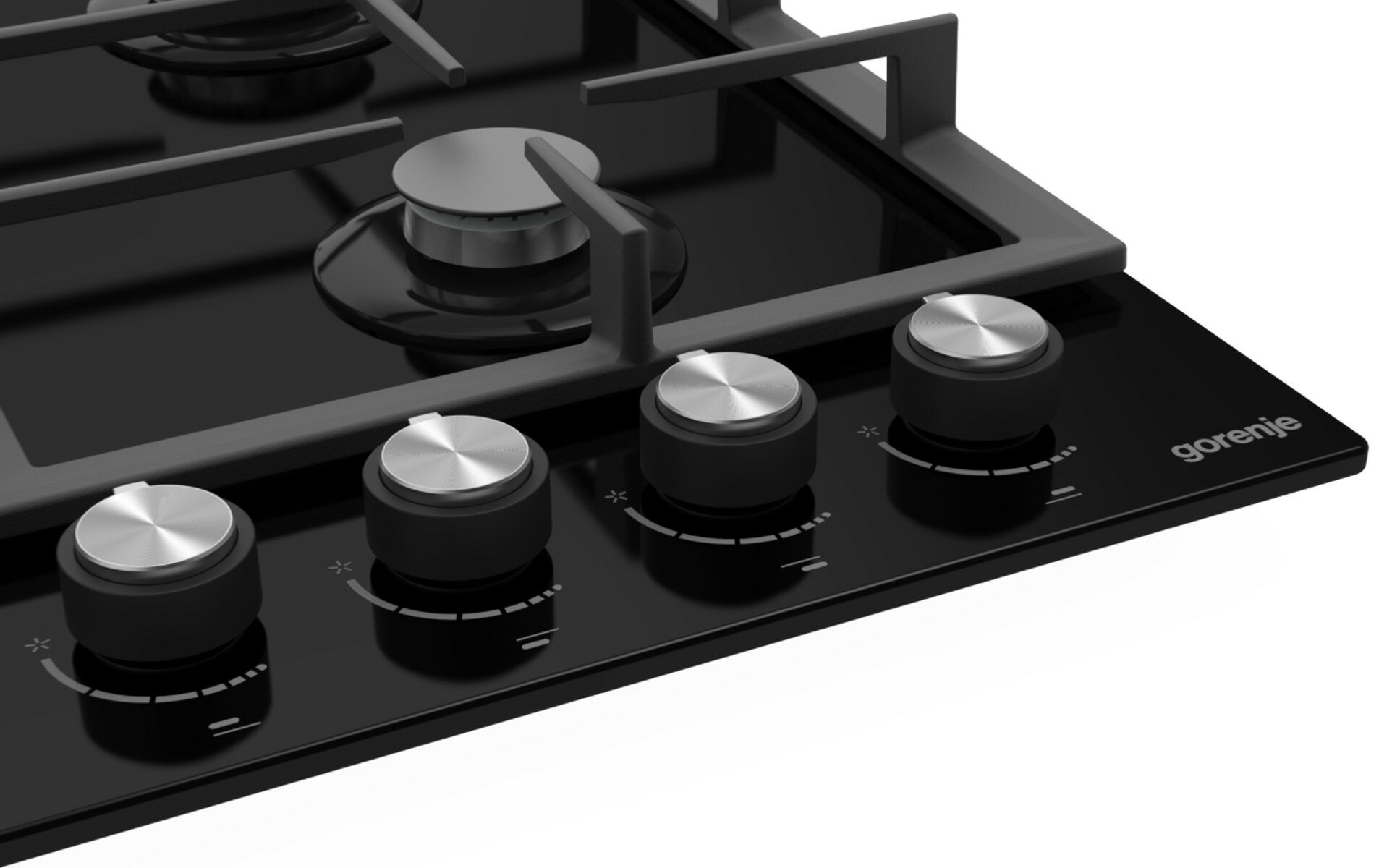 Czarna płyta gazowa z czterema palnikami i pokrętłami.