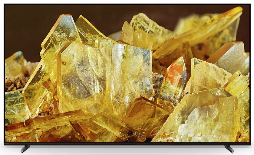 Zbliżenie struktury kryształu, żółtej i przezroczystej. Odbicia światła.