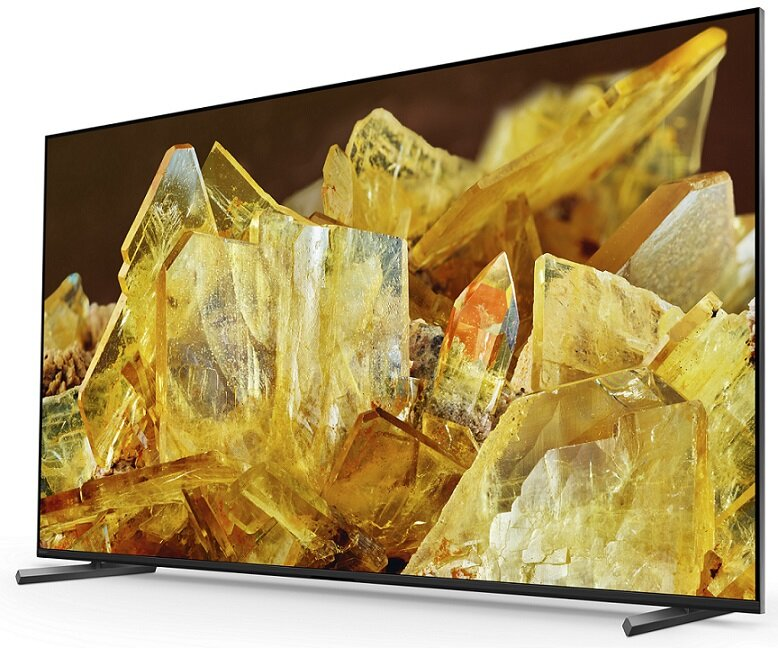 Telewizor wyświetla abstrakcyjny obraz żółtego kryształu.