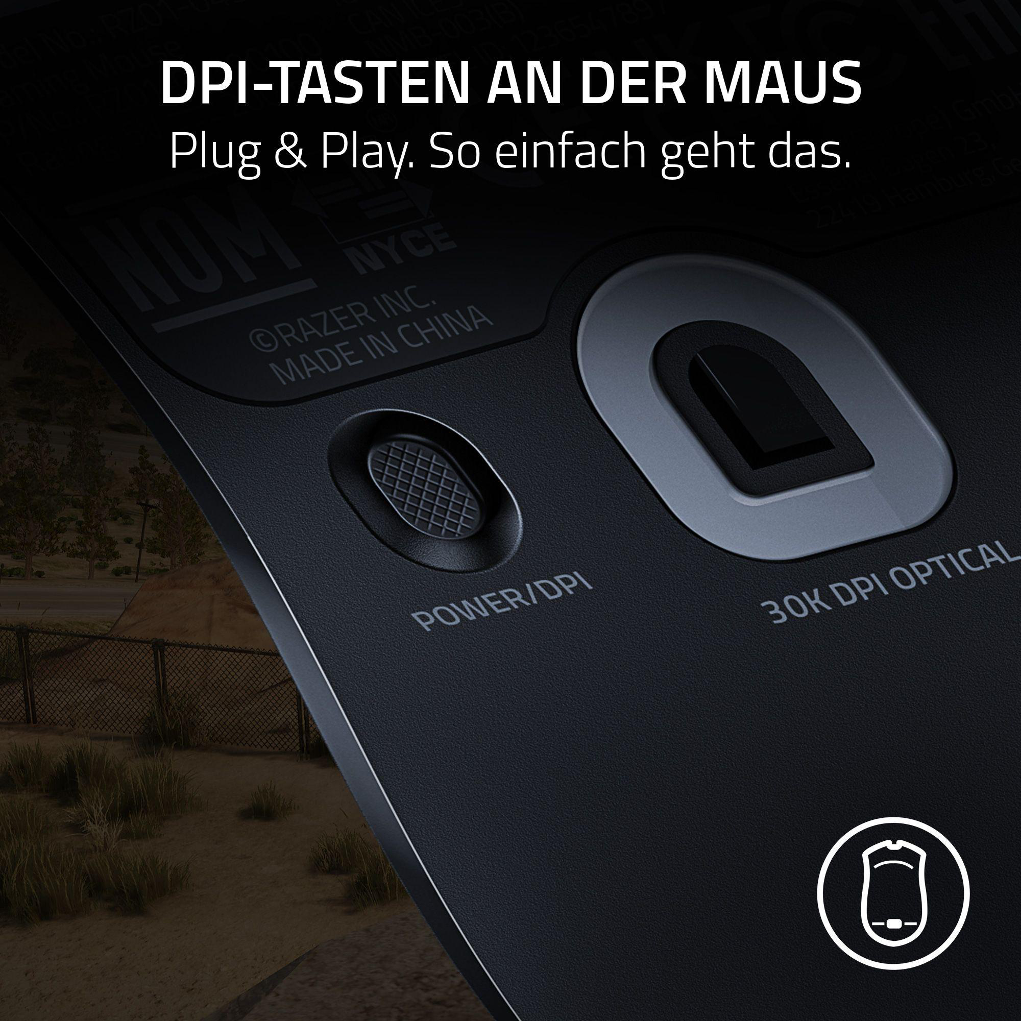 Nahaufnahme einer schwarzen Maus mit Power/DPI-Taste und 30K DPI-Details.