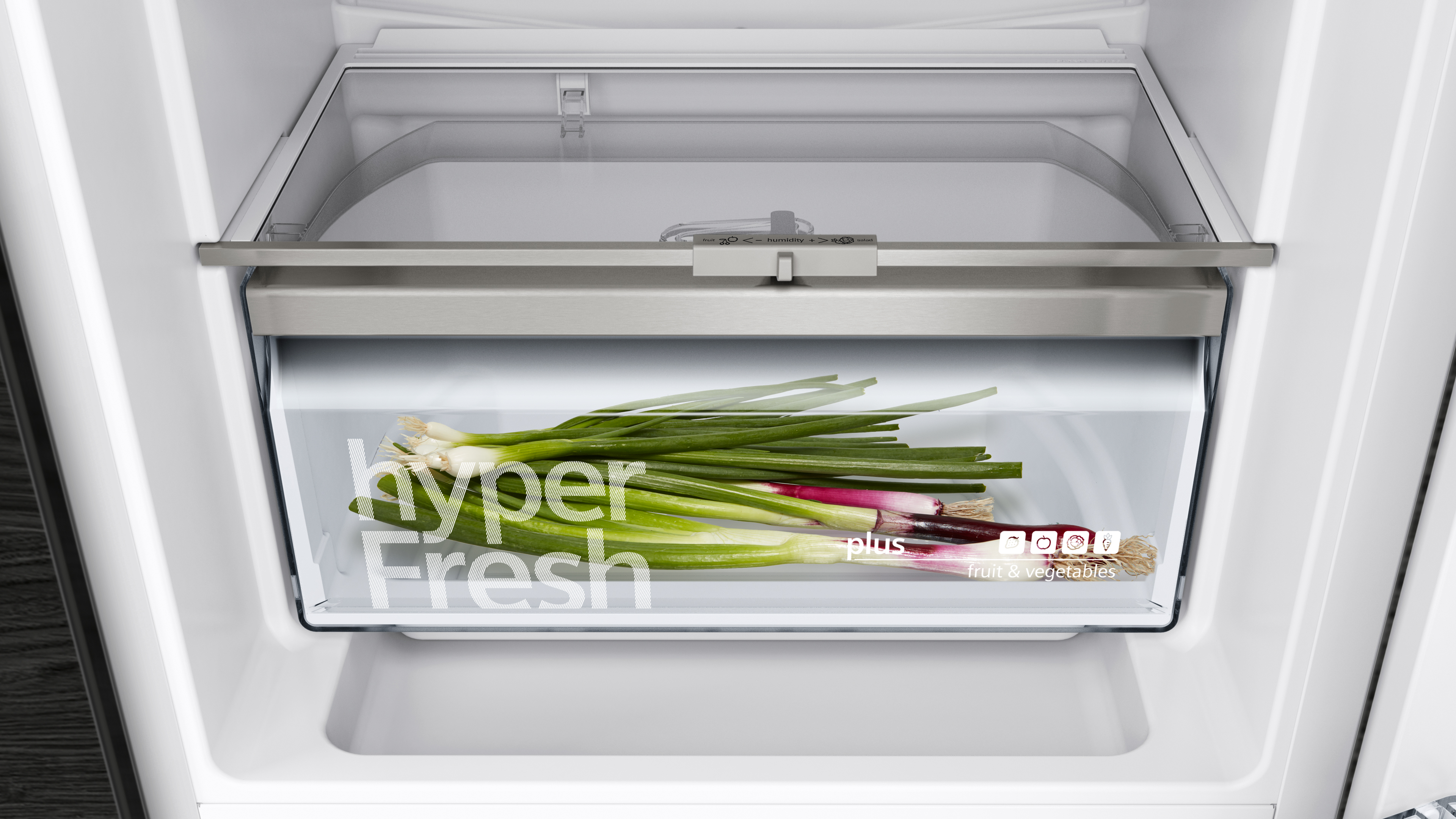 Tiroir de réfrigérateur avec oignons verts et "hyper Fresh".