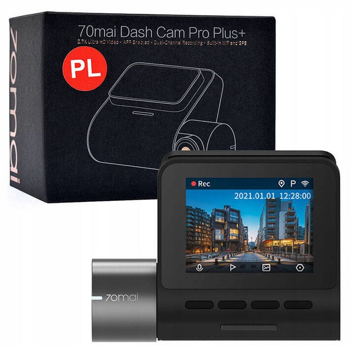 Czarna kamera samochodowa z pudełkiem. Ekran wyświetla widok miasta.