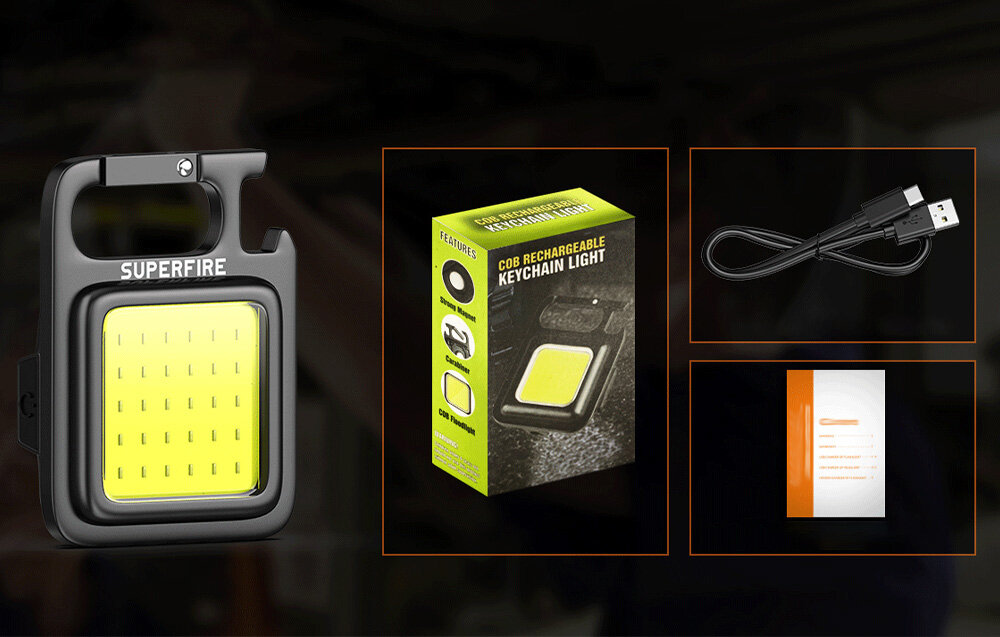 Czarno-biała lampka do breloczka z pudełkiem i akcesoriami.