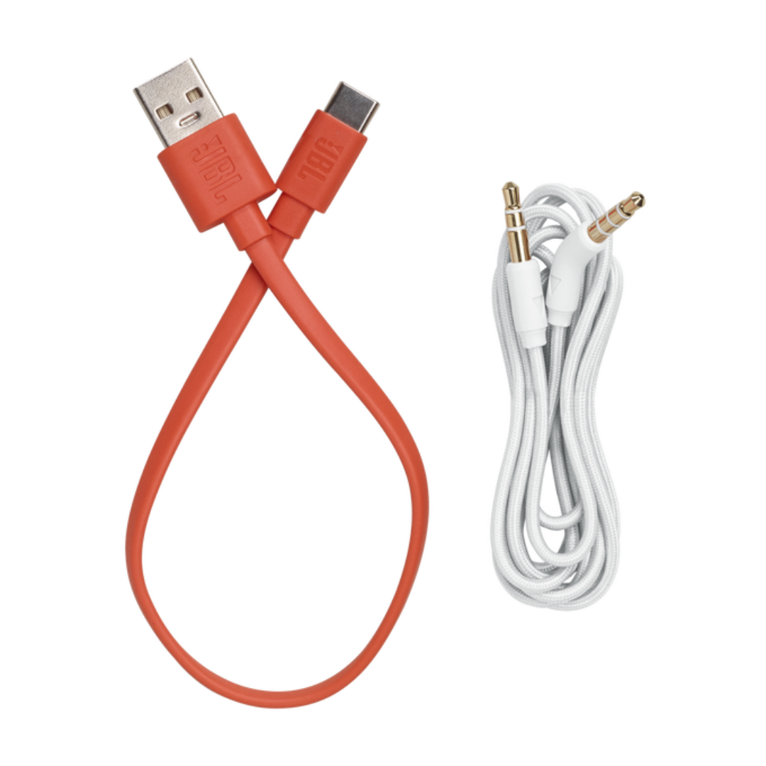 Cables naranja y blanco. Cable USB a USB-C naranja y cable de audio blanco.