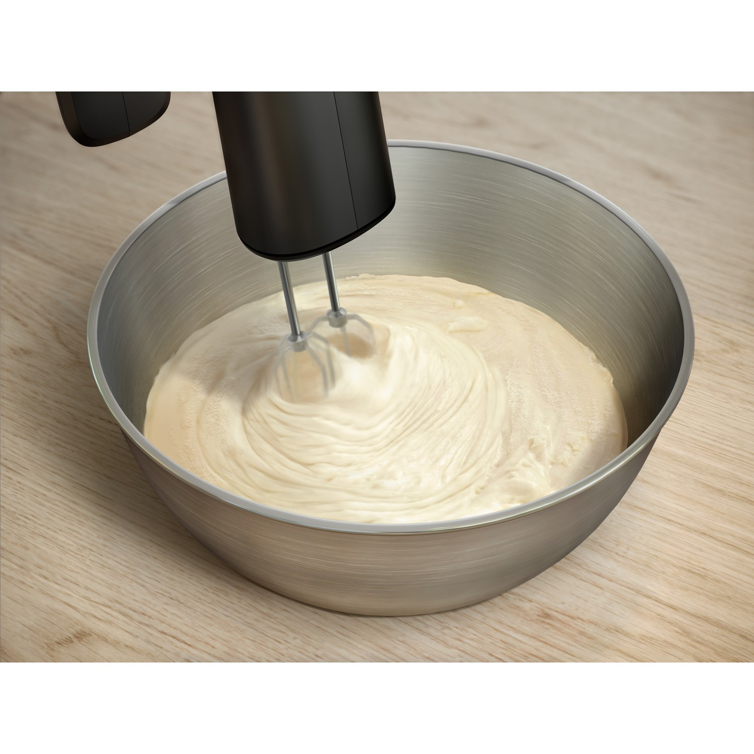 An electric mixer mixes a white substance in a metal bowl. The mixer is black.
