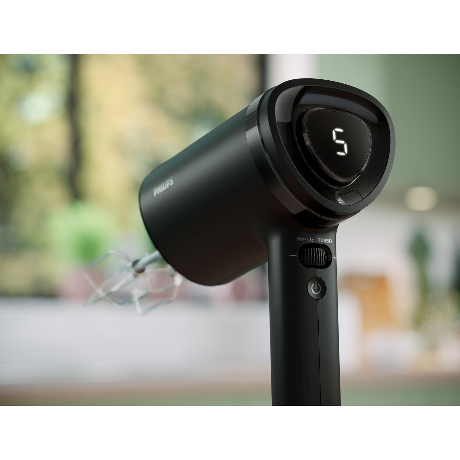 A black Philips hand mixer with a digital display showing number 5.