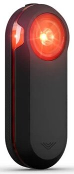 Czarna lampka rowerowa Garmin z czerwonym światłem na białym tle.