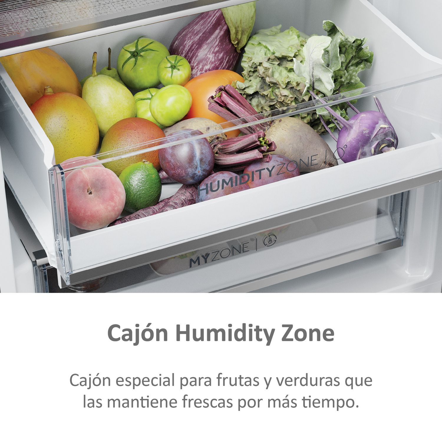 Cajón de refrigerador lleno de frutas y verduras variadas.