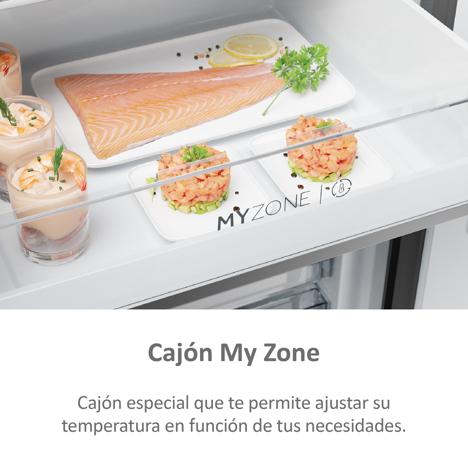 Cajón del refrigerador con comida. Salmón y dos platos de comida con guarniciones.