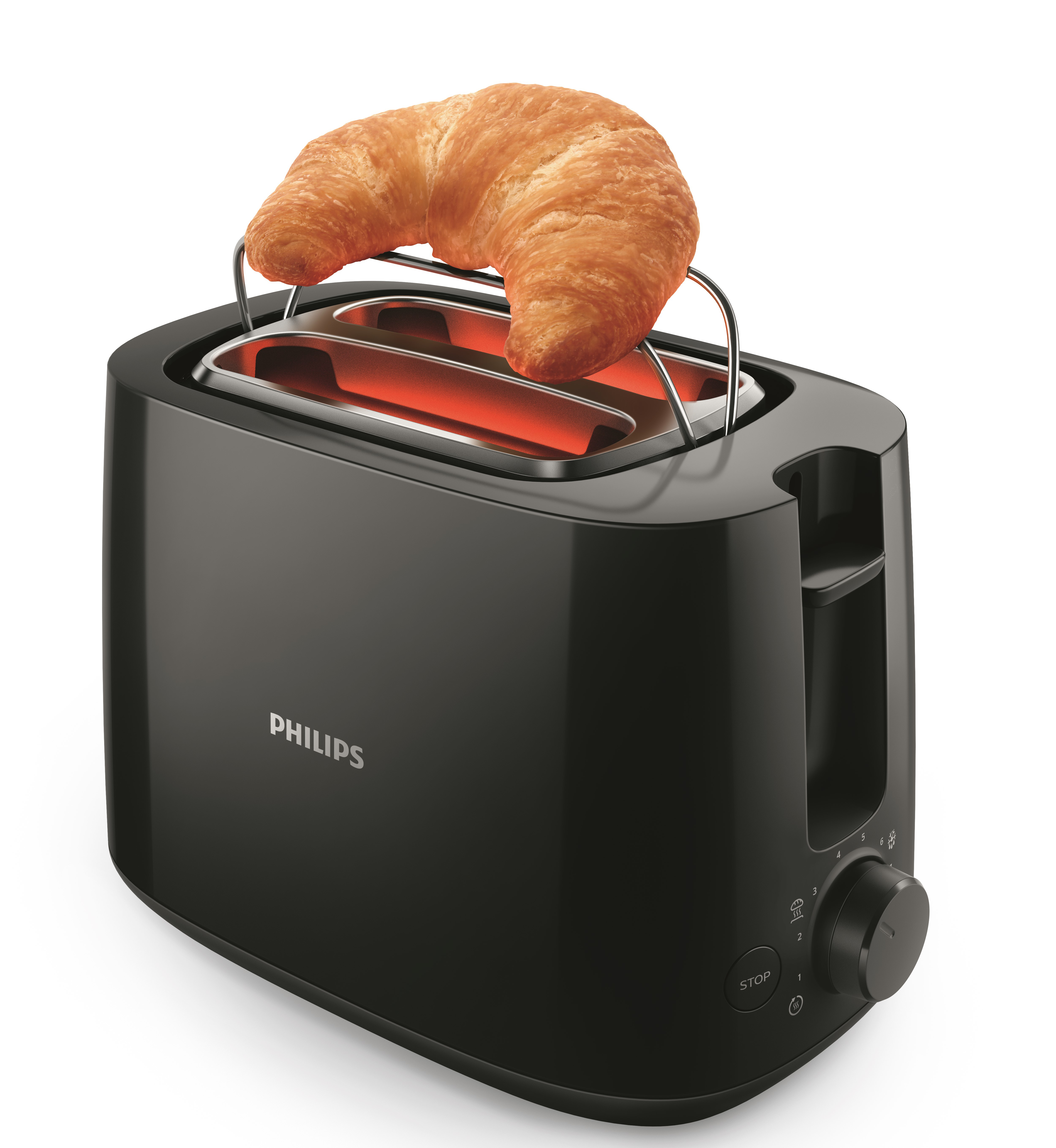 Fekete kenyérpirító, tetején croissant-val. Piros izzószálak láthatók.