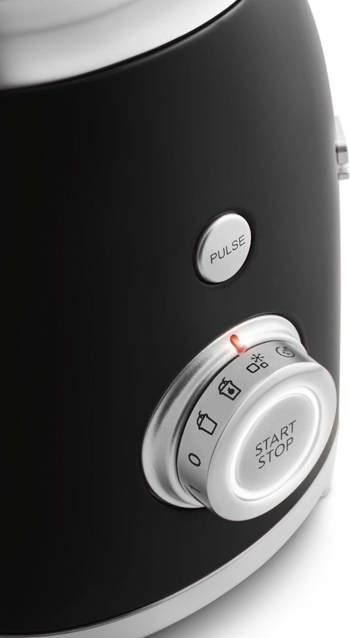 Un blender noir et argent avec un cadran argenté marqué 'Start/Stop' et 'Pulse'.