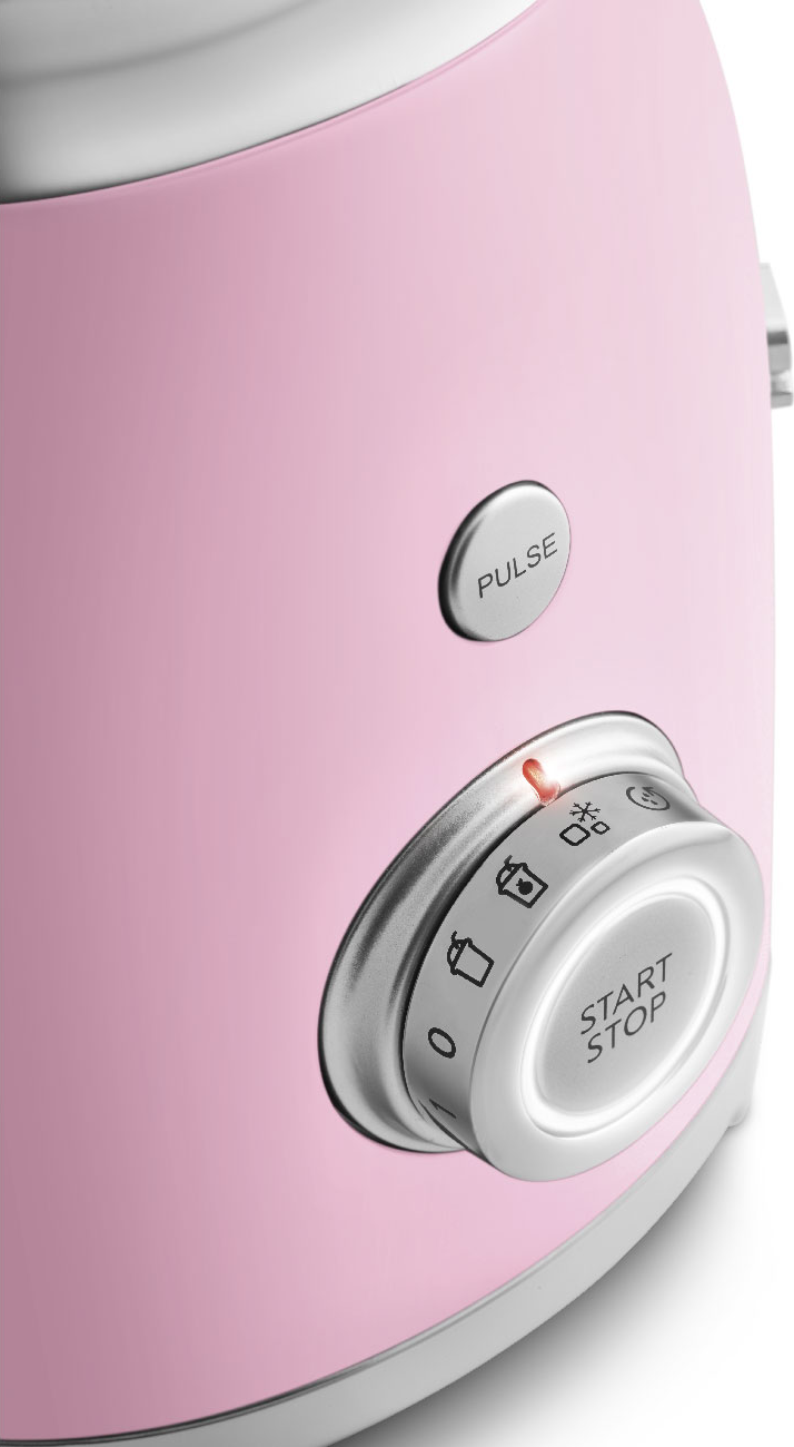 Nahaufnahme eines rosa Mixers mit silbernem Akzent.