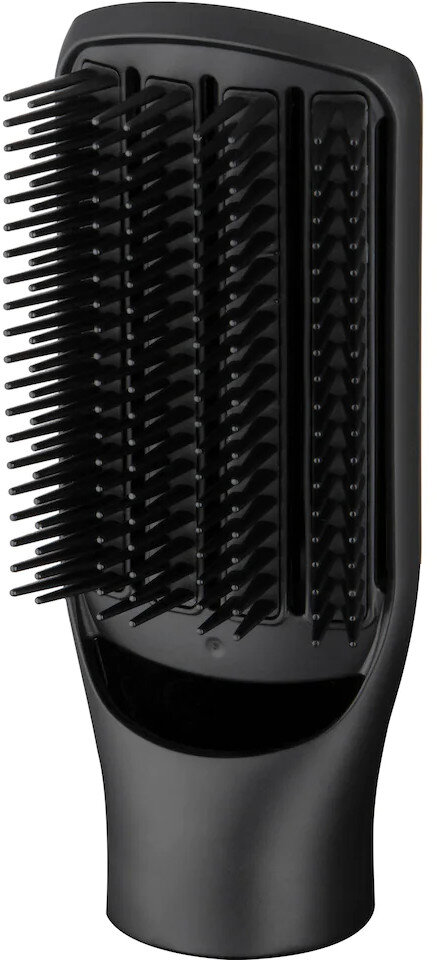 Czarny element mocujący szczotki do stylizacji włosów na białej powierzchni.