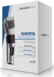 Białe pudełko z czarną suszarką do włosów i akcesoriami, wyprodukowane we Włoszech.