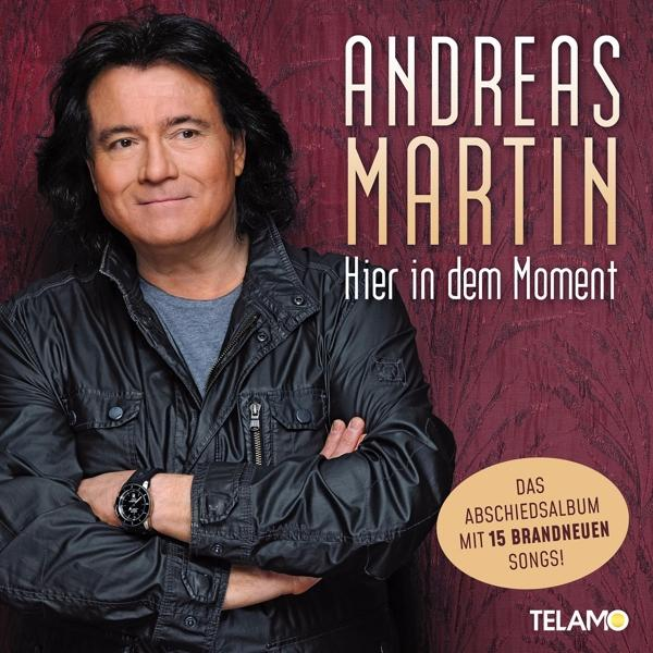 Albumcover von Andreas Martin. Er trägt eine schwarze Jacke. Der Titel lautet Hier in dem Moment.