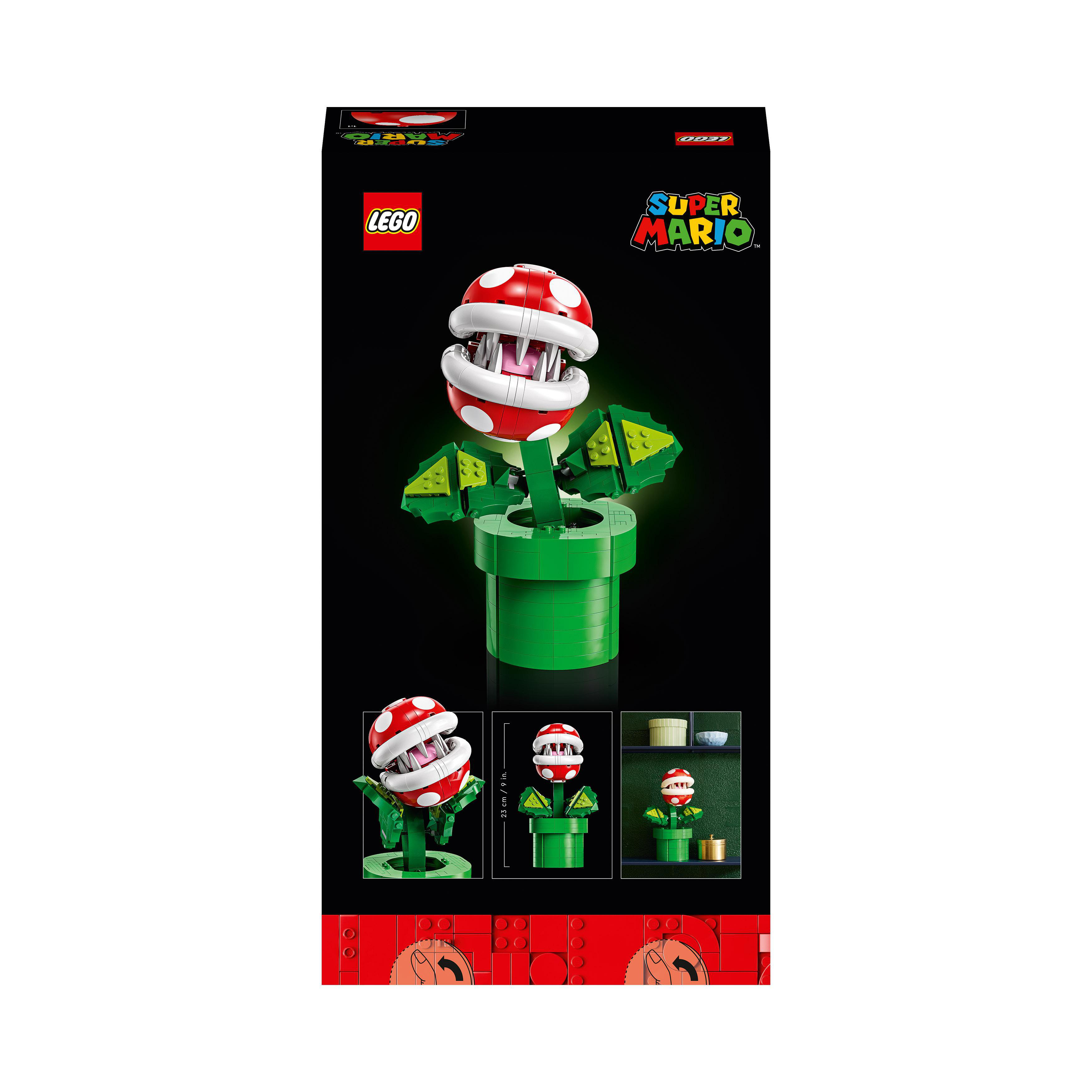 LEGO Super Mario Piranha-Pflanze in einem grünen Rohr auf schwarzem Hintergrund.