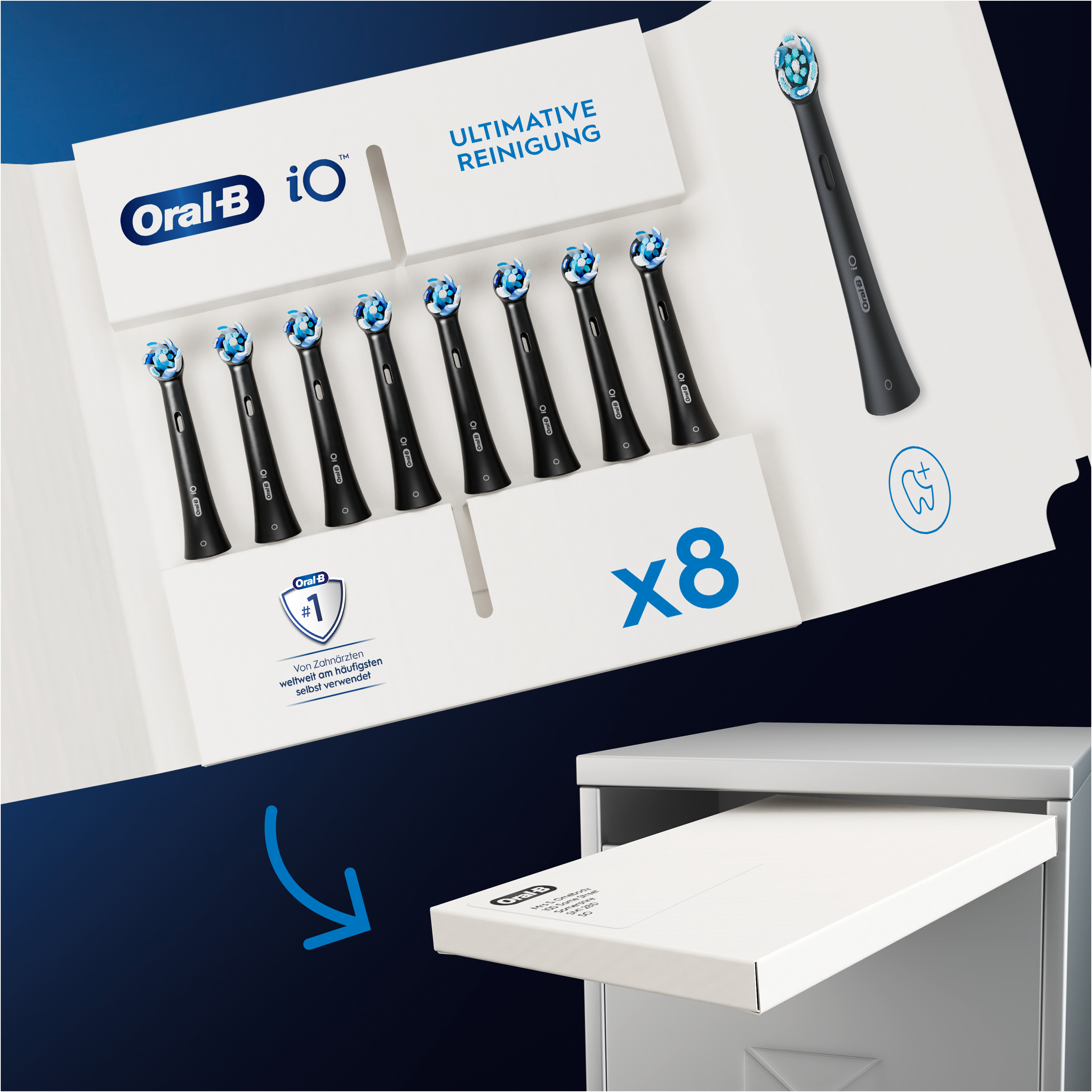 Una scatola aperta di testine per spazzolino Oral-B iO e uno spazzolino nero.