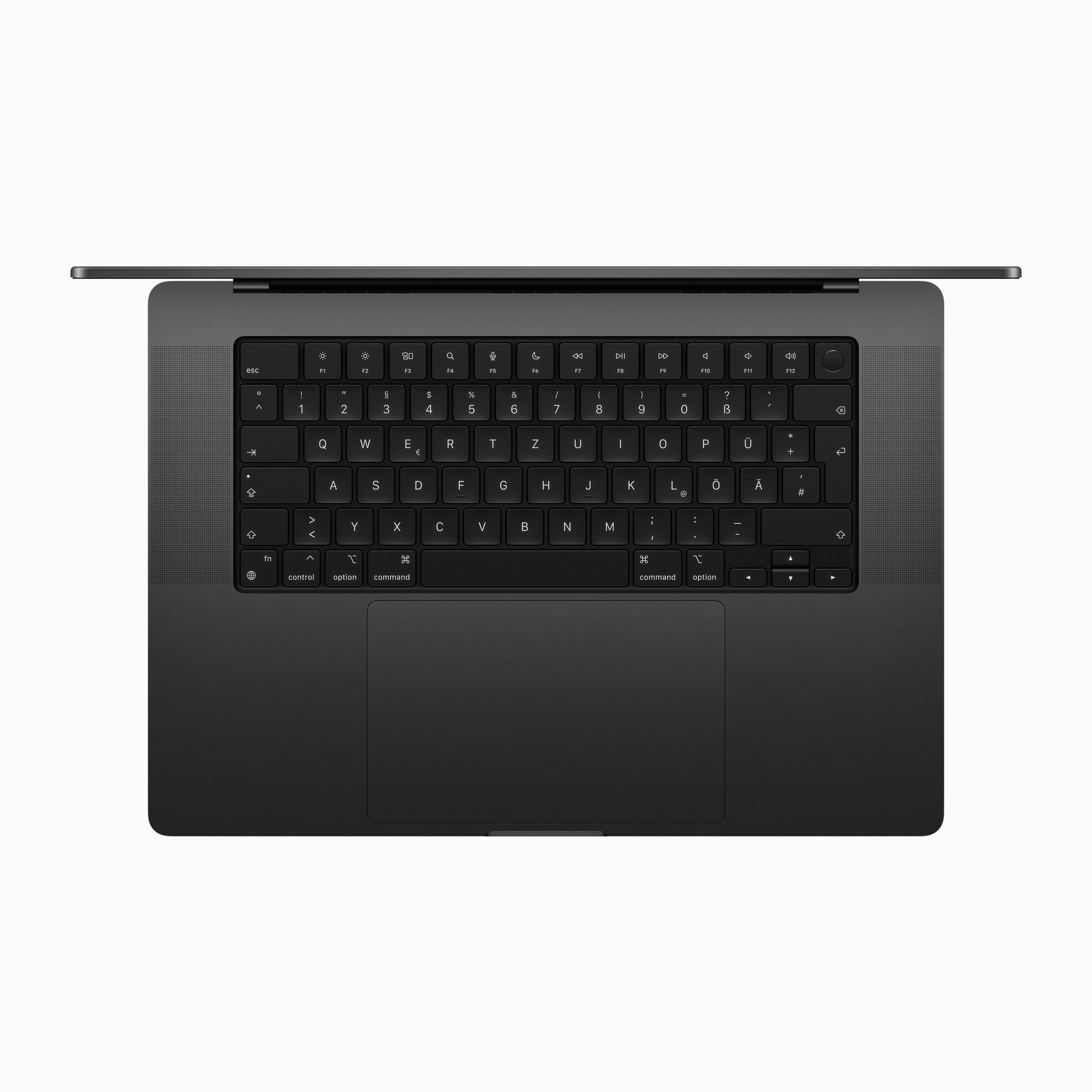 Draufsicht auf eine schwarze MacBook Pro-Tastatur mit beleuchteter Tastatur und fokussiertem Trackpad.