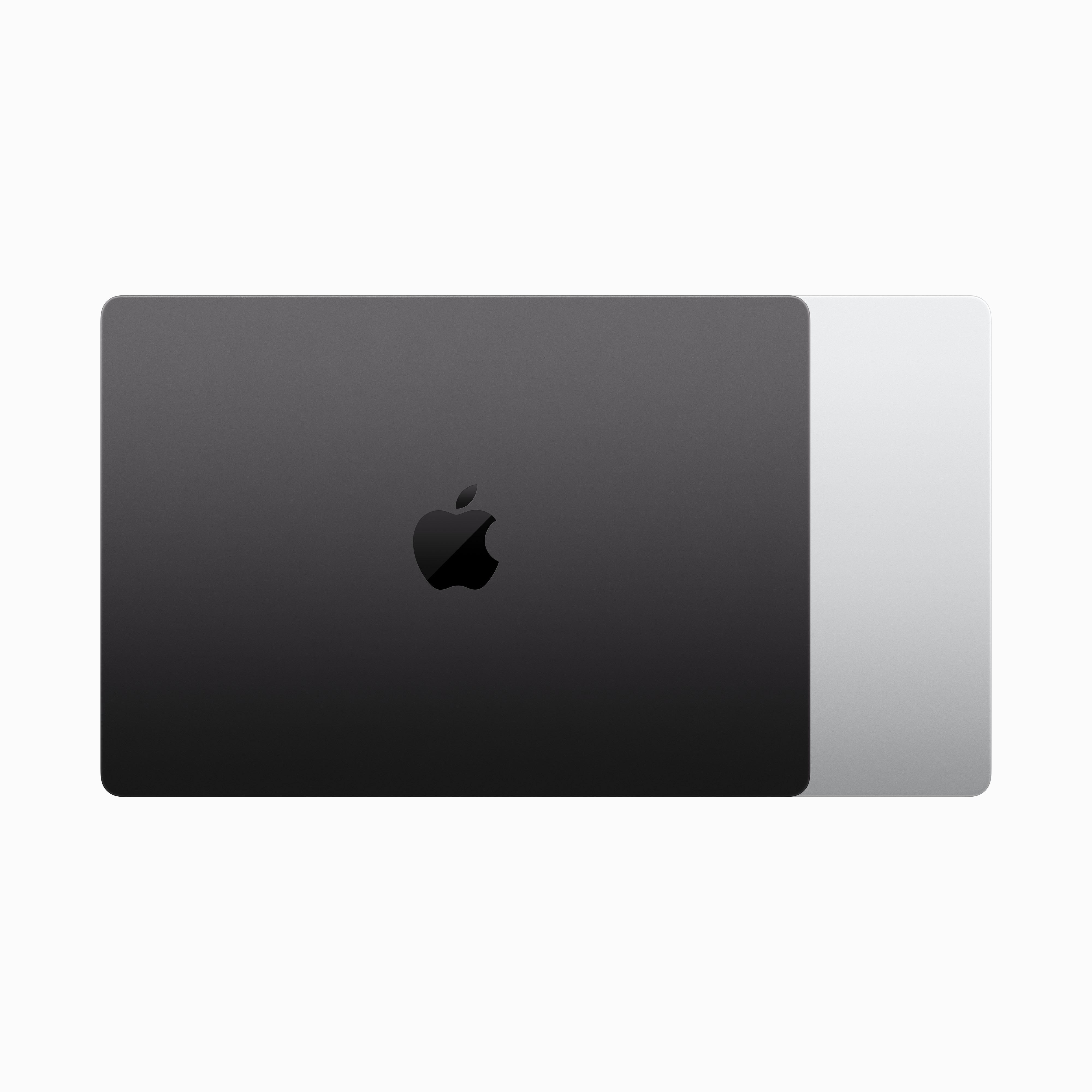 Geschlossenes schwarzes MacBook, Apple-Logo auf dunkler Oberfläche.
