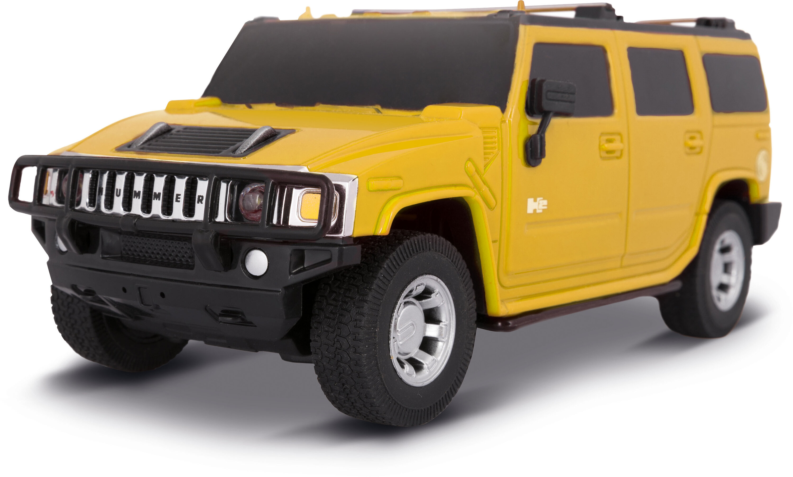 Żółta zabawka Hummer H2 SUV jest pokazana na białym tle.