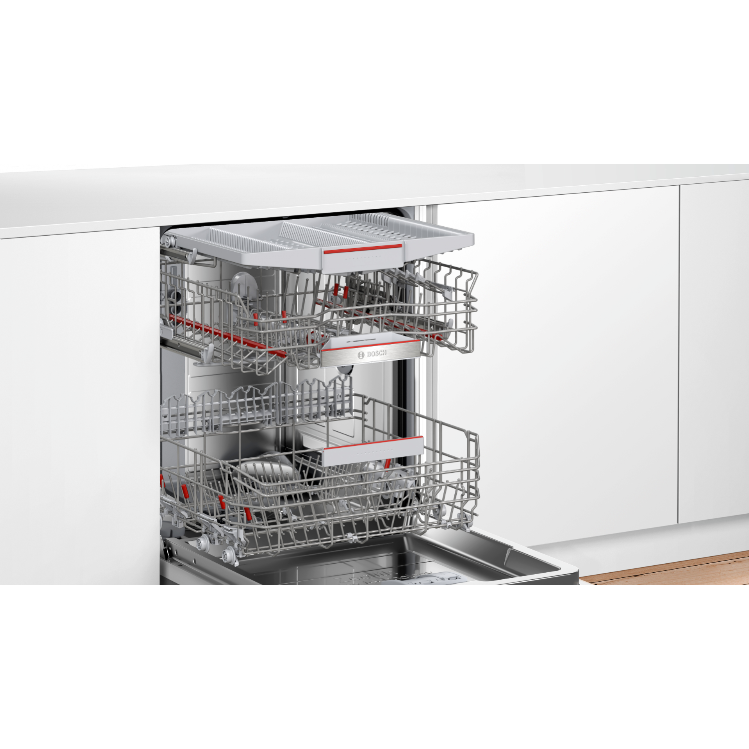 Vaatwasserinterieur met rekken en een gedeeltelijk open deur.