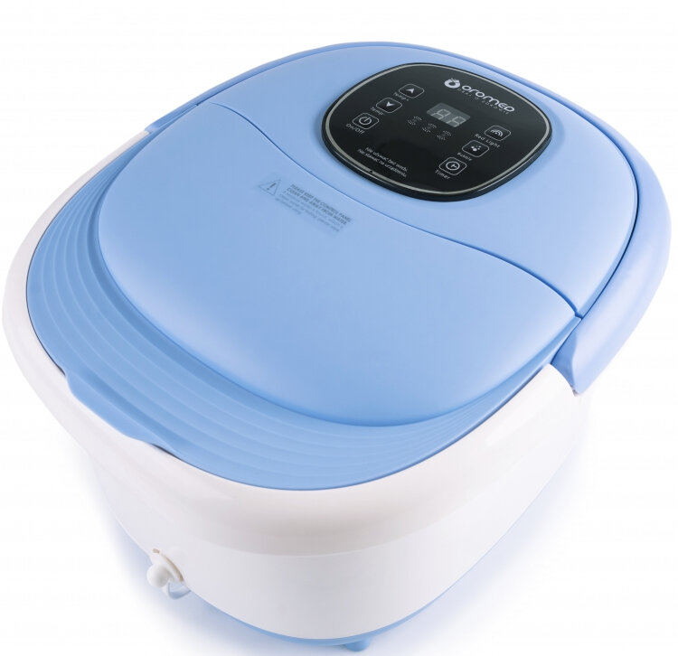 Niebiesko-białe spa do stóp z cyfrowym wyświetlaczem i elementami sterującymi.