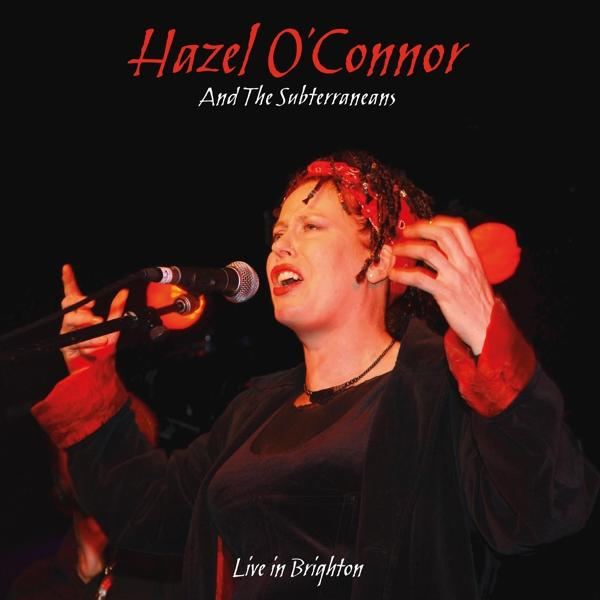 Hazel O'Connor album borítója, élőben Brightonban, fekete háttérrel.