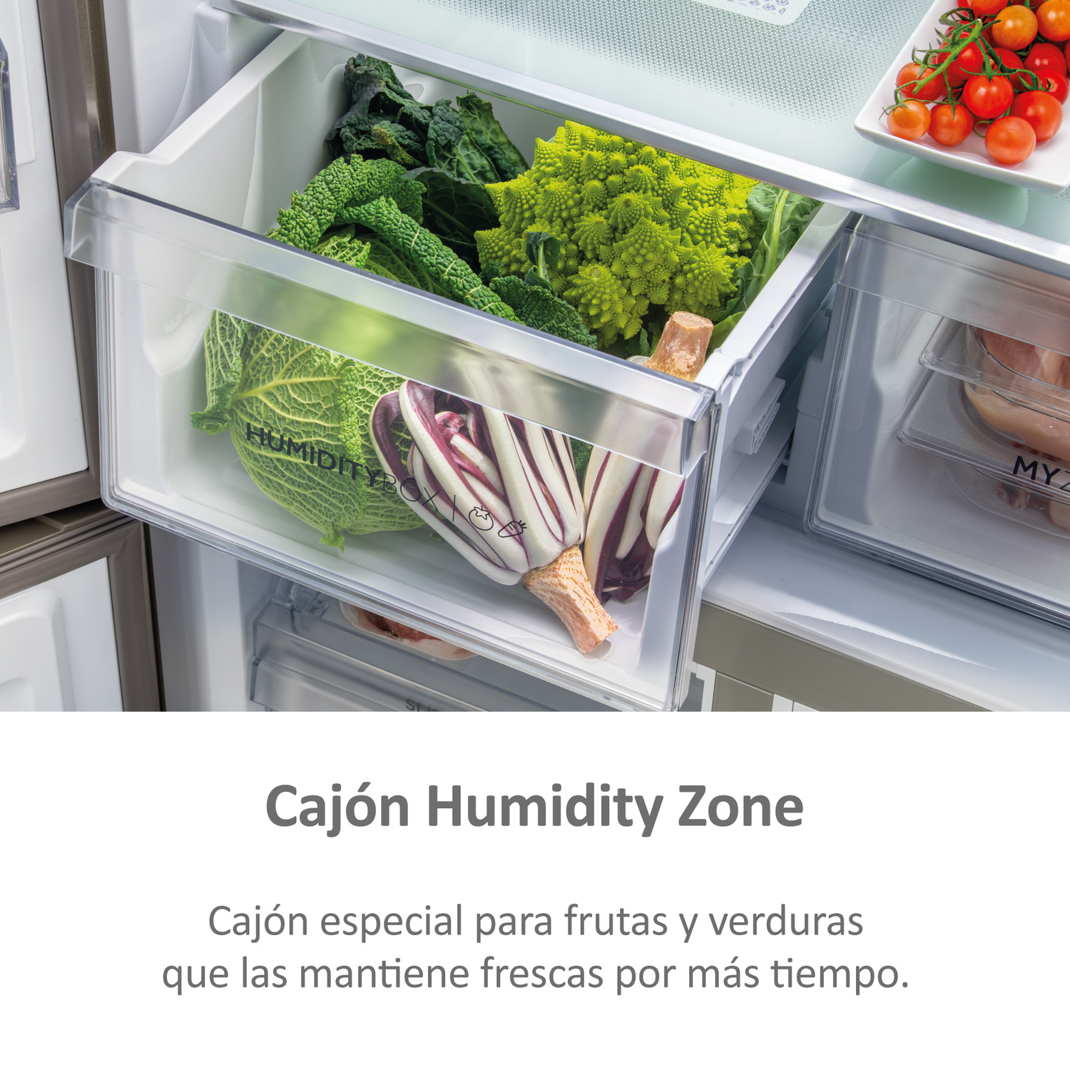 Verduras en un cajón de nevera con la etiqueta "Humidity Zone".