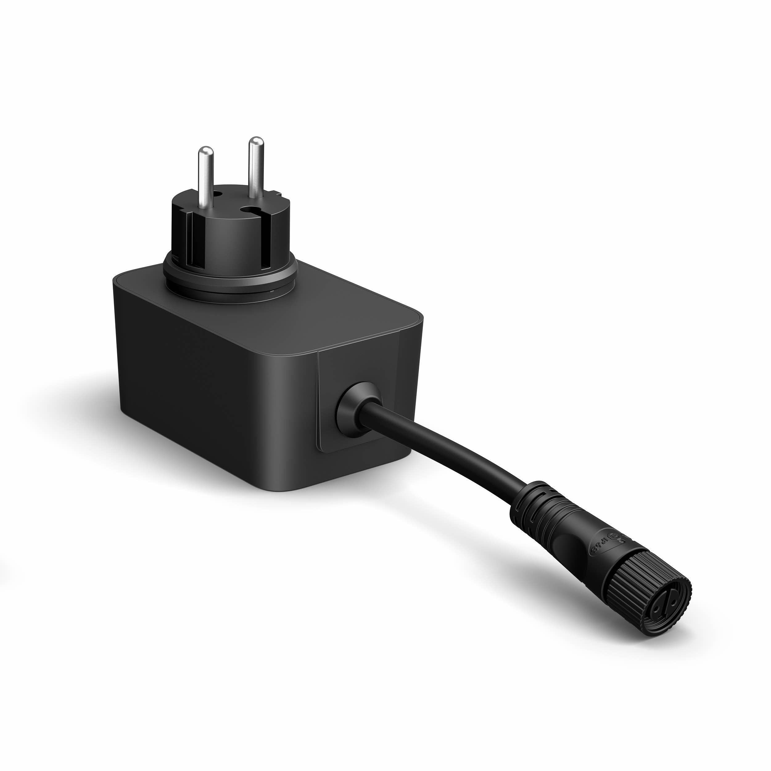 Schwarzer Adapter mit europäischem Stecker und schwarzem Kabel mit Stecker.