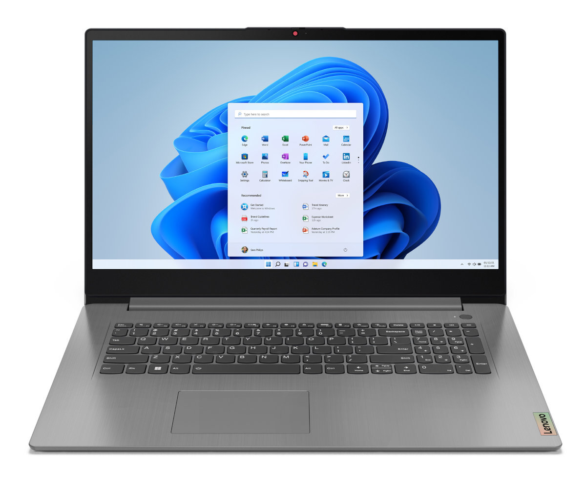 Srebrny laptop z interfejsem Windows 11. Ekran wyświetla aplikacje i niebieskie tło.