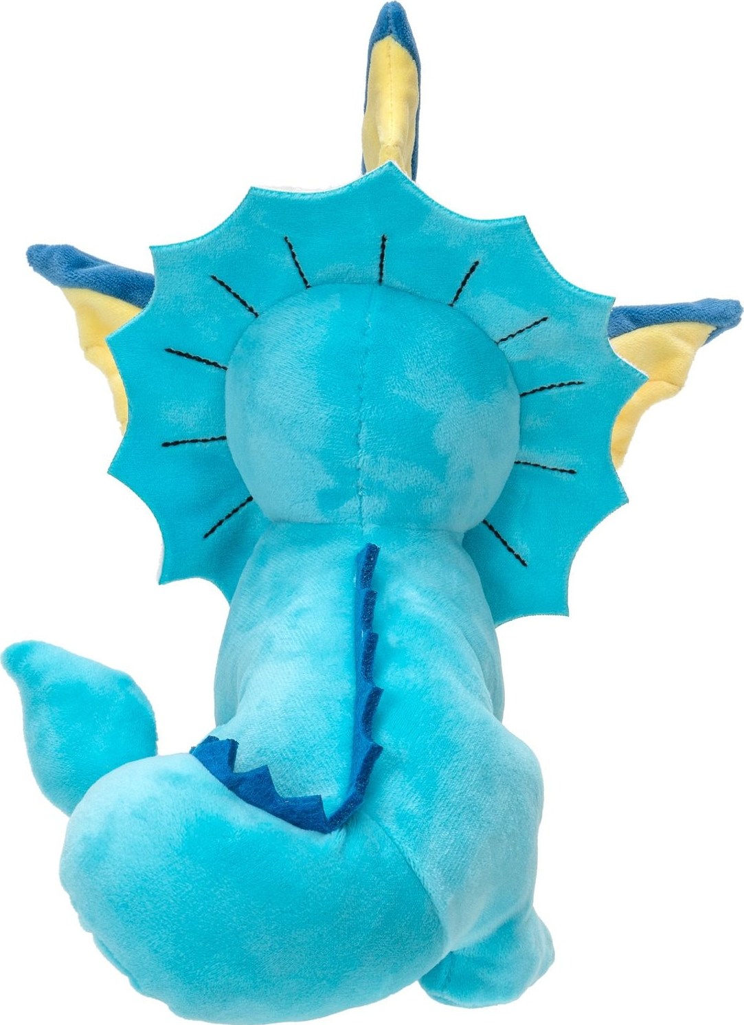 Blaues Plüschtier Vaporeon, Rückansicht, zeigt Flossen und Schwanz.