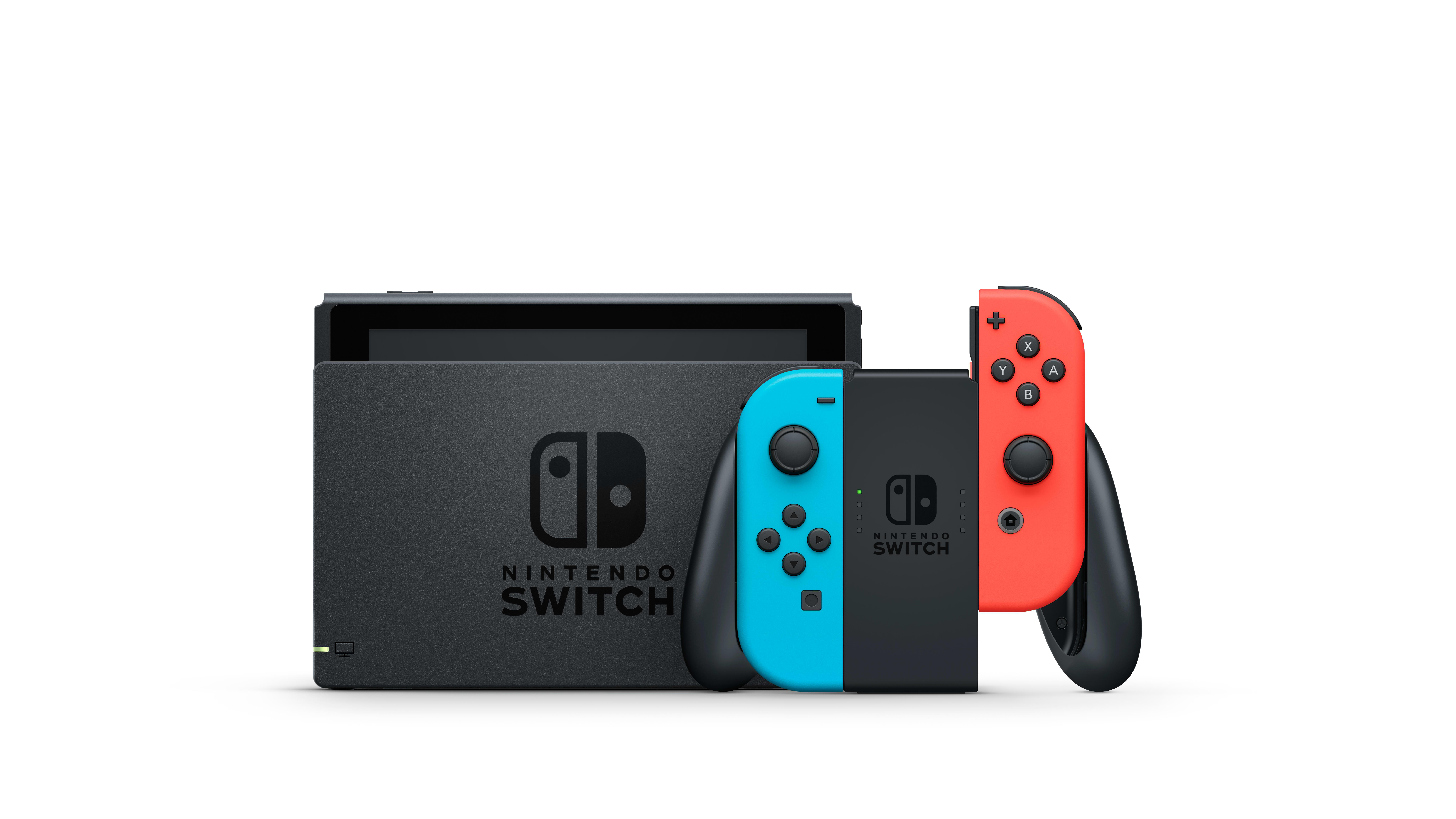 Schwarze Nintendo Switch Konsole mit zwei Joy-Con-Controllern, blau und rot, auf weißer Oberfläche.