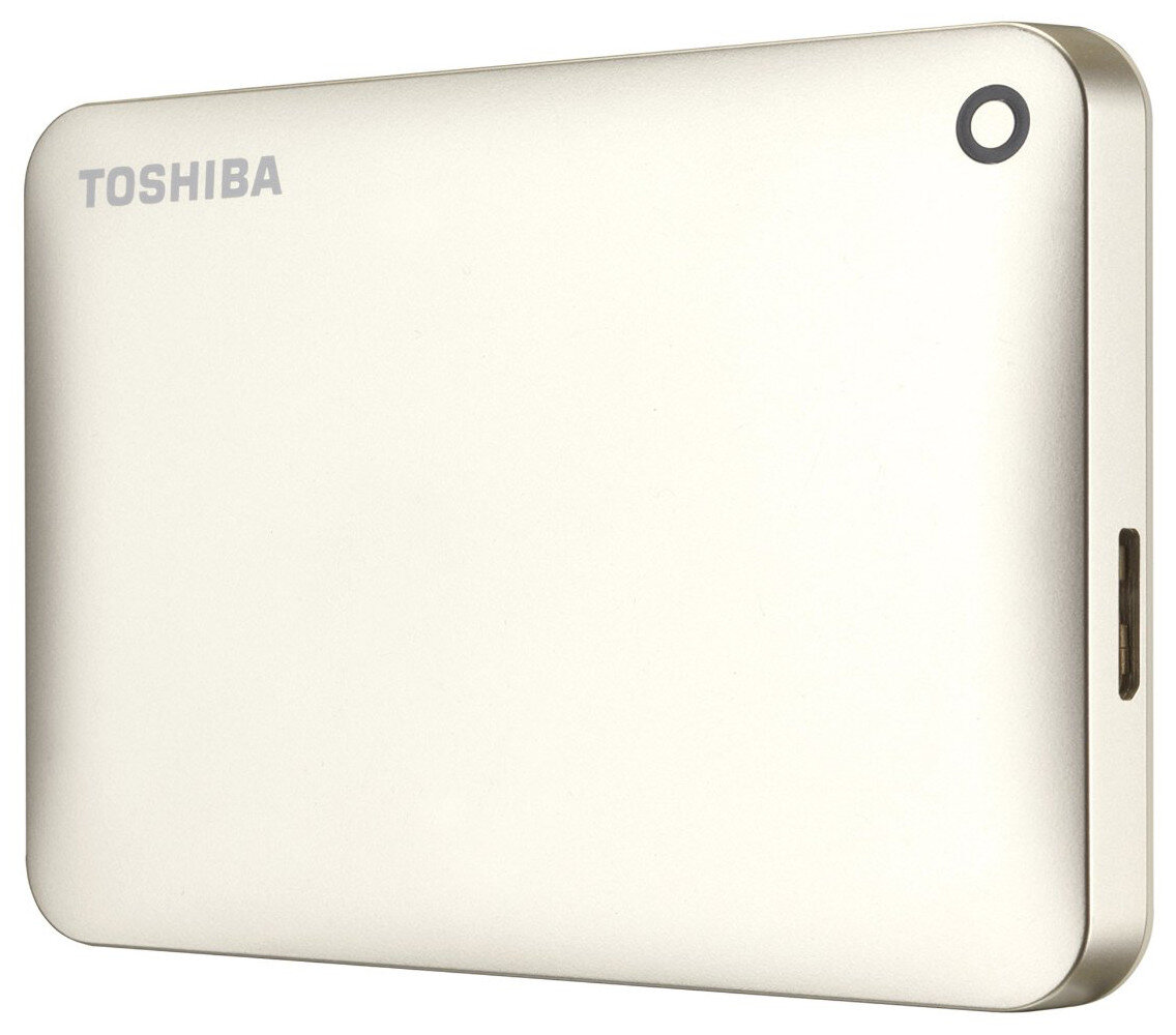 Srebrny zewnętrzny dysk twardy Toshiba z ikoną koła i portem.