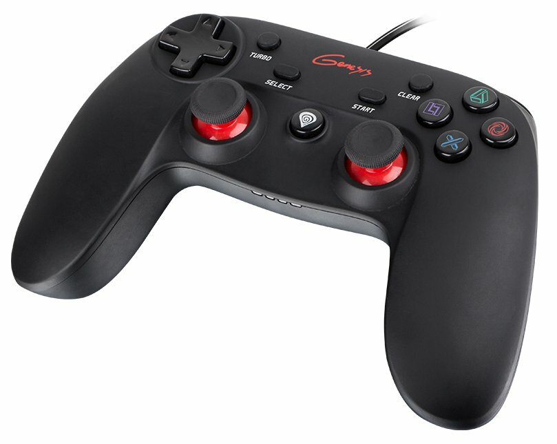 Czarny kontroler do gier Genesis z czerwonymi drążkami. Widoczne przyciski Turbo i inne.
