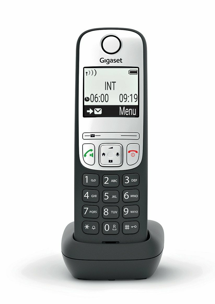 Telefon bezprzewodowy z bazą, wyświetlający czas i opcje menu.