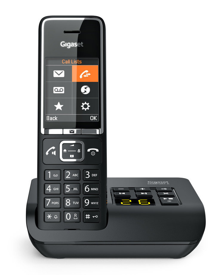 Czarny telefon z ekranem wyświetlającym ikony i podstawą.