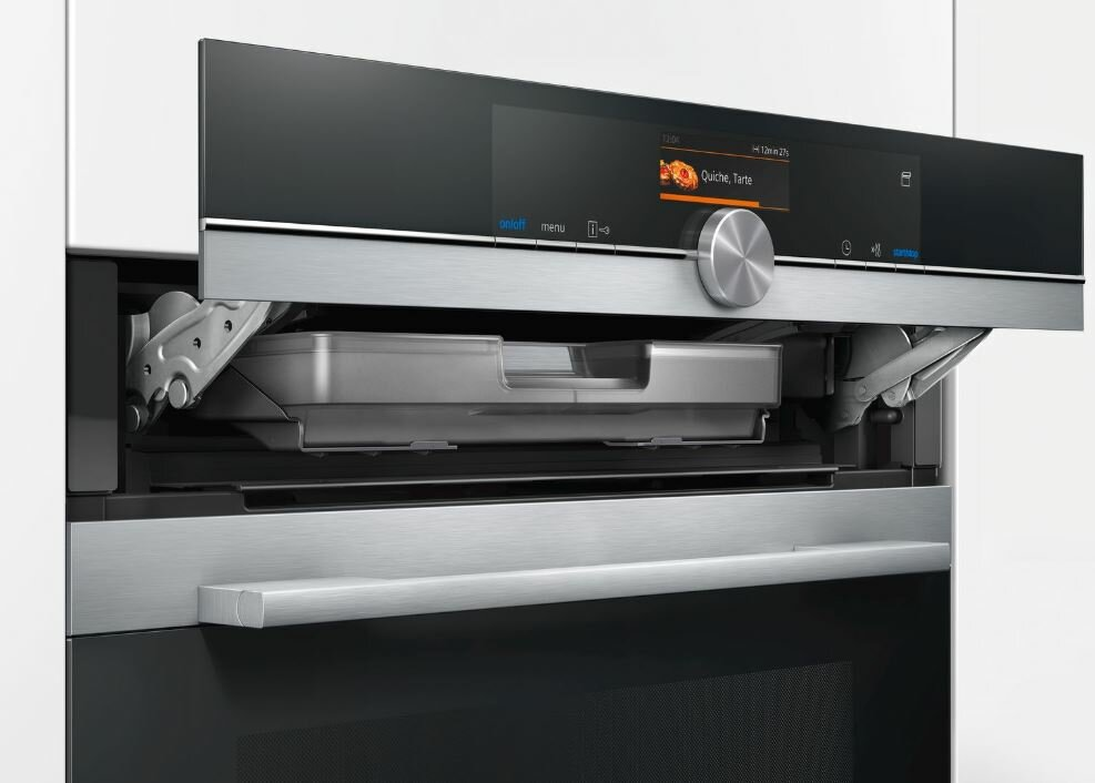 Nowoczesny piekarnik z cyfrowym wyświetlaczem z przepisem. Taca wysuwa się.