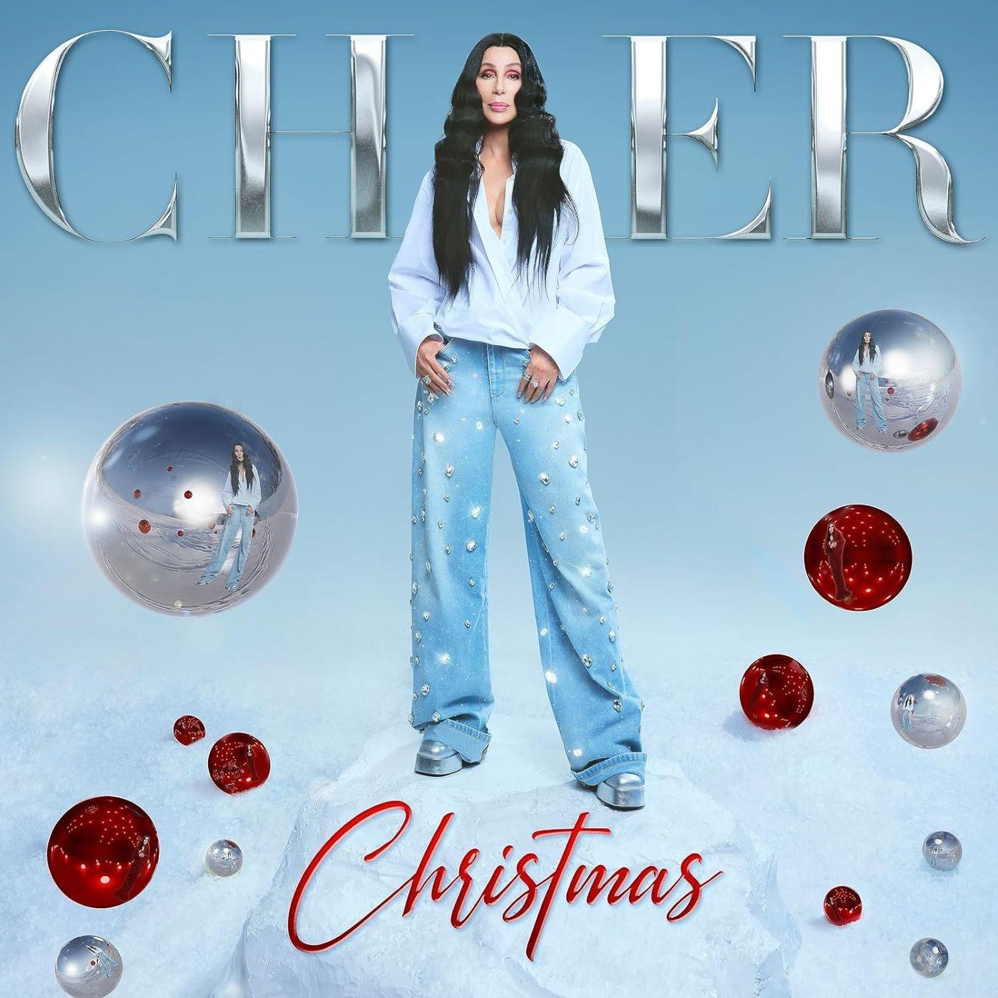 Cher hóban áll, gömbök veszik körül. Az album címe: "Christmas".