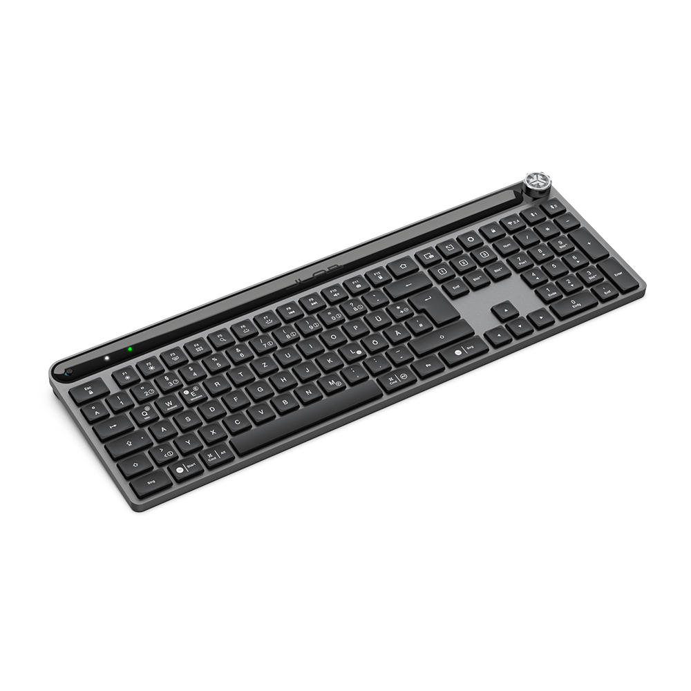 Schwarze Tastatur auf weißer Oberfläche mit verschiedenen Tasten.