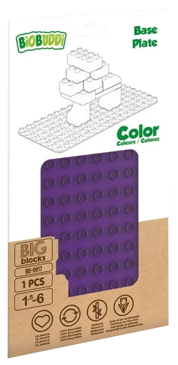 A képen egy lila alaplap látható, sok kör alakú bütyökkel, egy fehér és szürke Lego-blokkal.