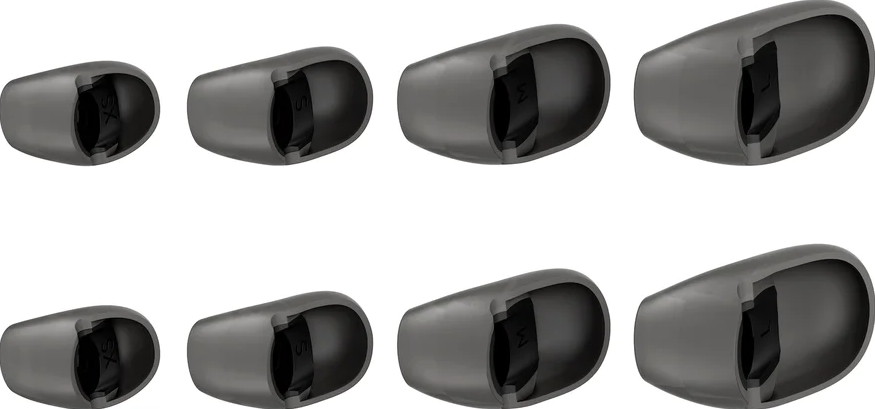 Huit embouts d'oreille gris foncé de différentes tailles, pour écouteurs intra-auriculaires.