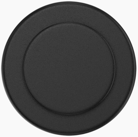 Czarny okrągły obiekt o teksturowanej powierzchni, z okrągłym wzorem.