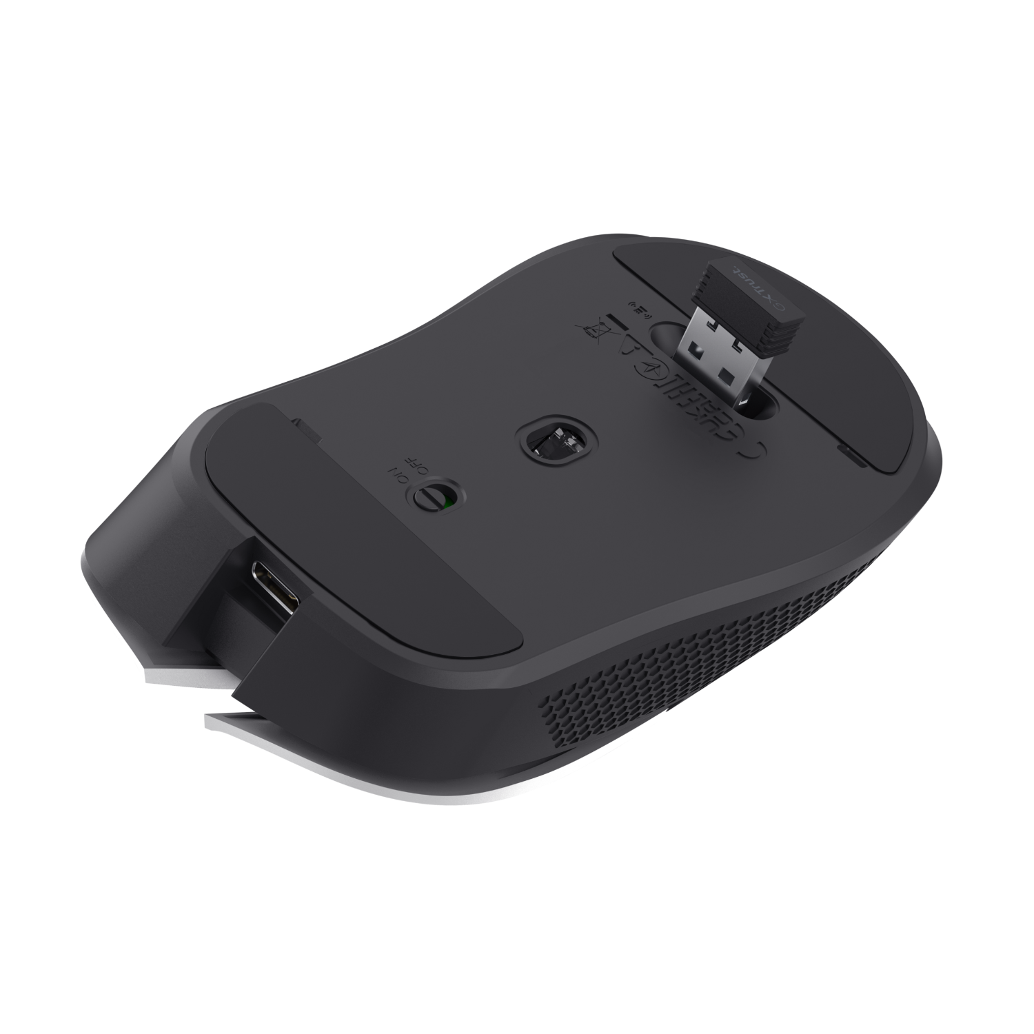 Black wireless mouse with a USB receiver inserted. It's on a dark surface.