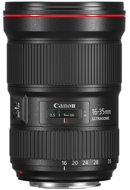 Obiektyw Canon 16-35mm, czarny z czerwonym pierścieniem, ze znacznikami ostrości i zoomu.