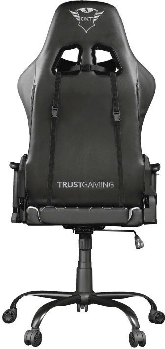 Czarny fotel gamingowy z tyłu. Posiada logo Trust Gaming i stoi na pięcioramiennej podstawie.