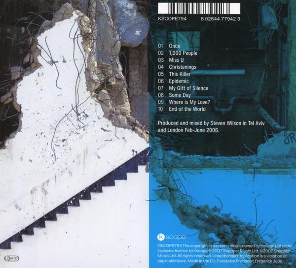 CD-Cover: zerbrochene Wand, Text und Titelliste der Band 'Porcupine Tree'.
