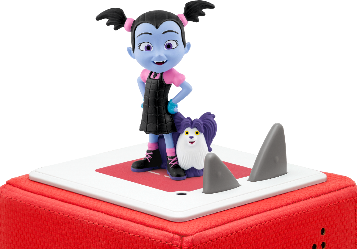 Eine Spielfigur eines Cartoon-Vampirmädchens mit einem Haustierhund auf roter quadratischer Basis.